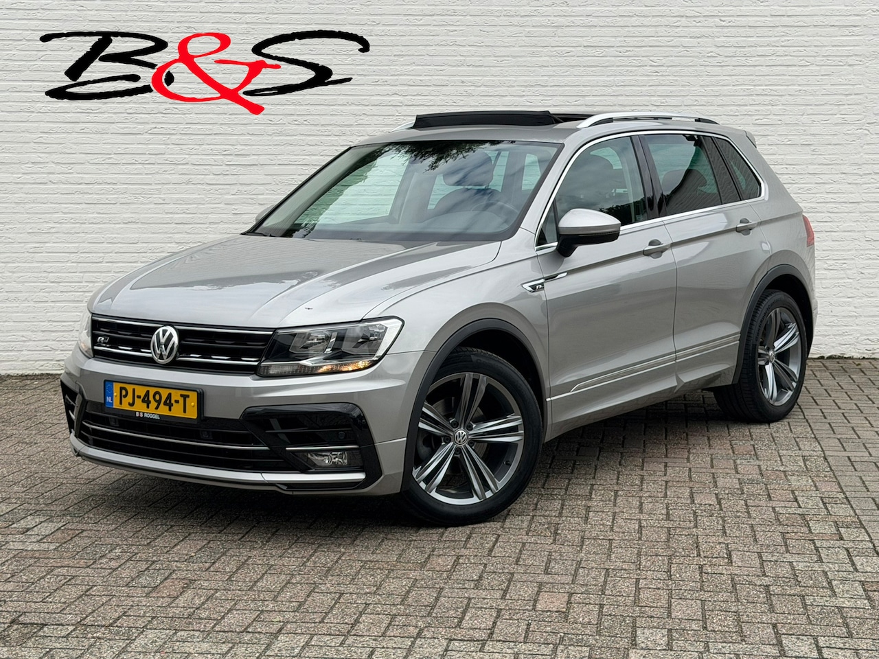 Volkswagen Tiguan - 1.4 TSI ACT R-Line Automaat Panorama Clima Stoelverwarming Carplay Cruise Pdc V+A - AutoWereld.nl