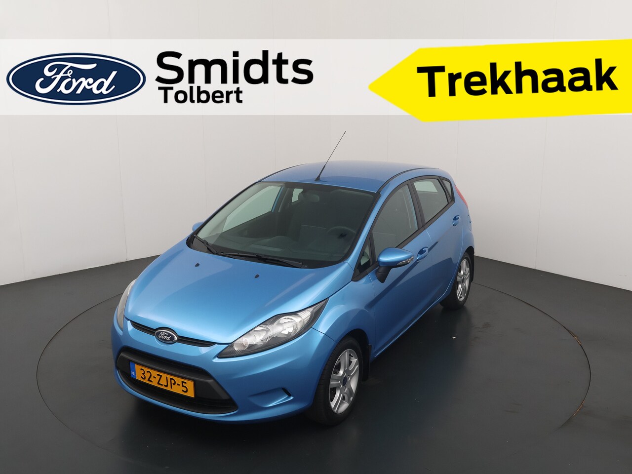 Ford Fiesta - 1.25 60PK Champion | Aux | Trekhaak | Cruise | Airco - AutoWereld.nl