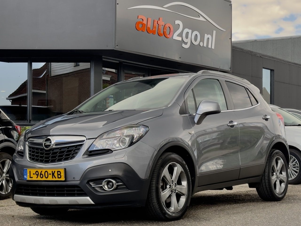 Opel Mokka - 1.7 CDTi COSMO AUTOMAAT SPORTLEDER AIRCO 18INCH.LMV PDC - AutoWereld.nl