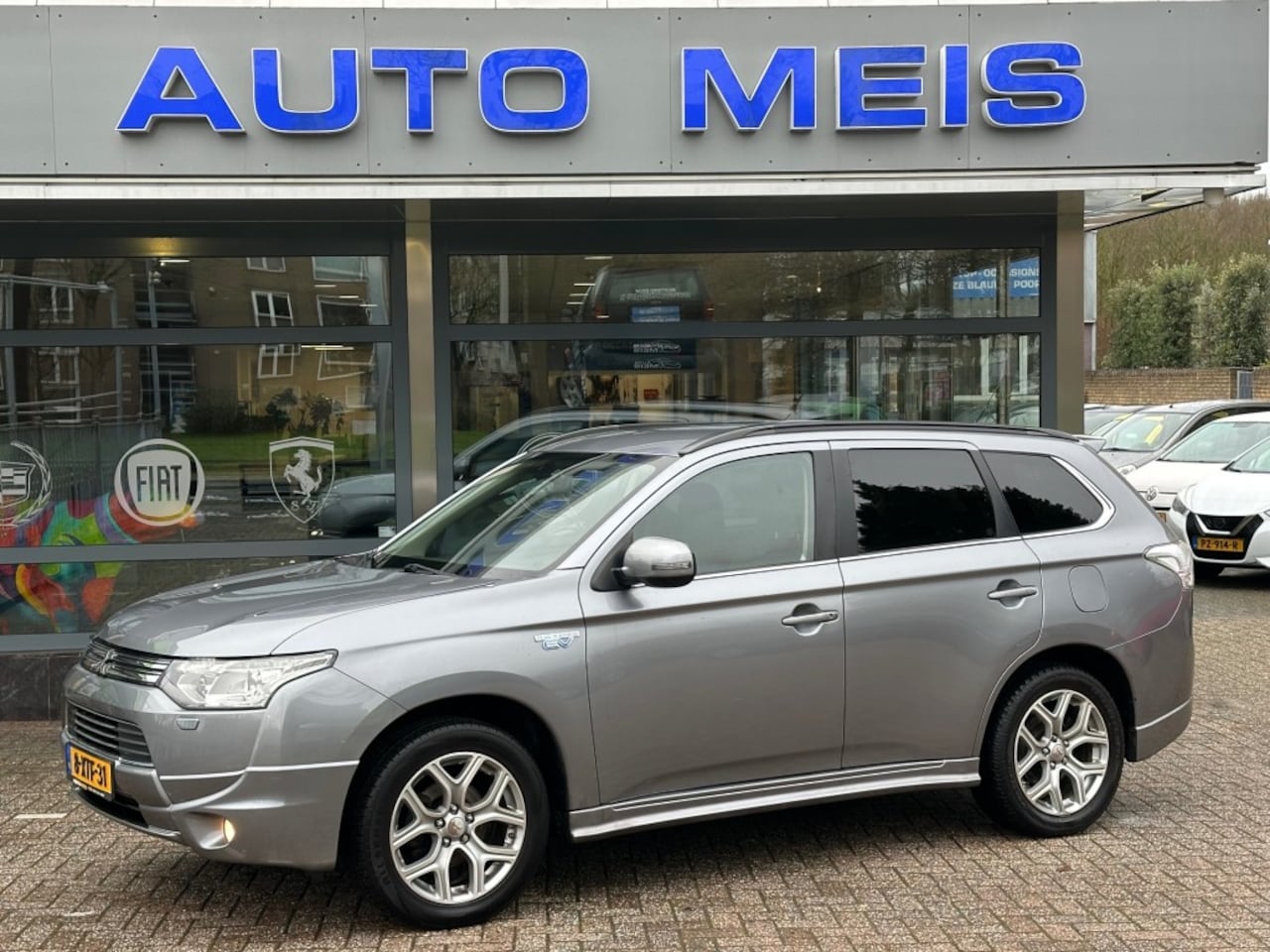 Mitsubishi Outlander - 2.0 PHEV Executive Edition Navi Camera Trekhaak - AutoWereld.nl