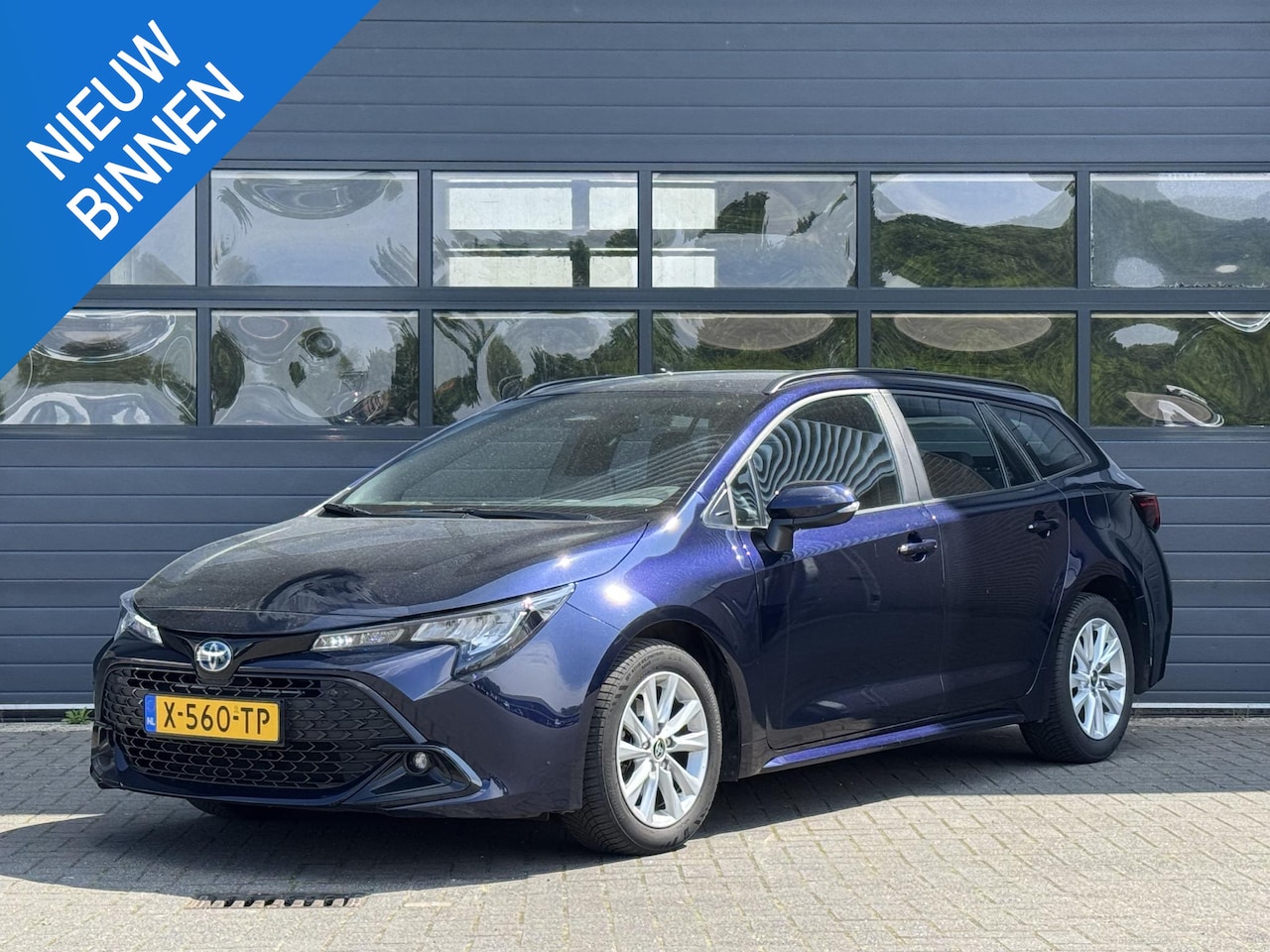 Toyota Corolla Touring Sports - HYBRID 140 ACTIVE I APPLE/ANDROID I P-CAMERA I CLIMATE CONTROL I CRUISE CONTROL - AutoWereld.nl