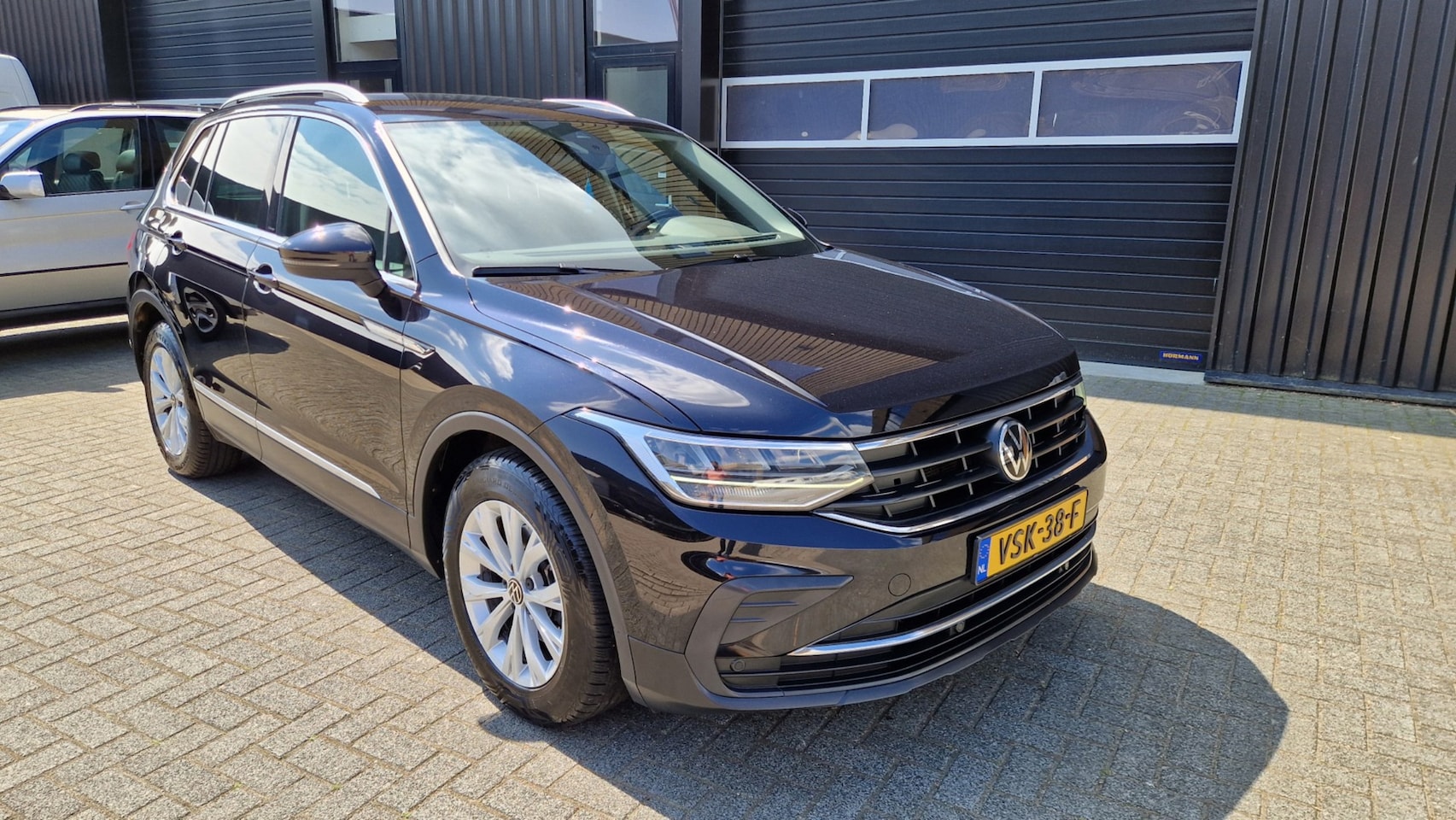 Volkswagen Tiguan - 2.0 TDI DSG Grijs Kenteken - AutoWereld.nl