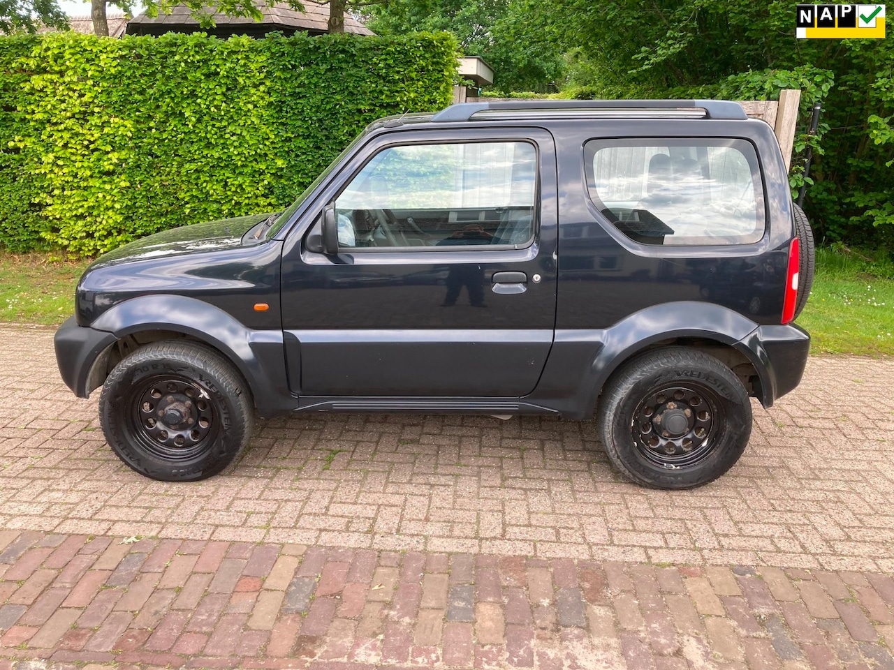 Suzuki Jimny - 1.3 JLX 4X4 - AutoWereld.nl