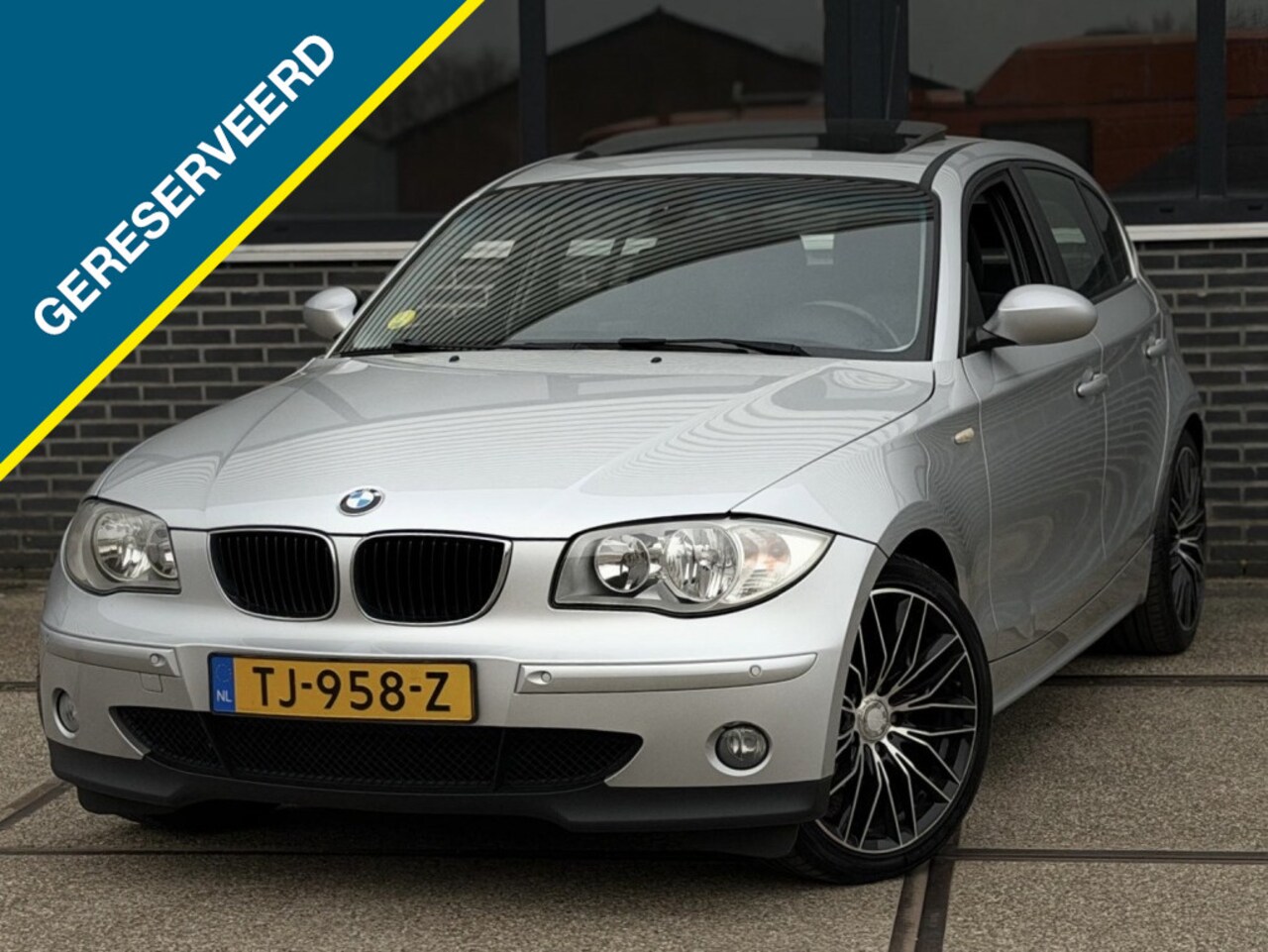 BMW 1-serie - 118i High Executive |Schuifdak |CruiseC |LM18 - AutoWereld.nl
