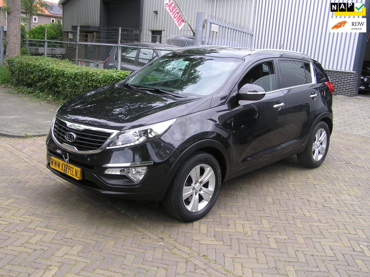 Kia Sportage - 2.0 X-ecutive Plus Pack nap pas airco nieuwe apk - AutoWereld.nl