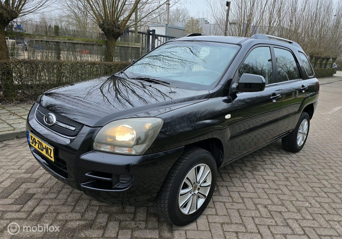 Kia Sportage - 2.0 CVVT X-pect 2.0 CVVT X-pect Nieuwe APK - AutoWereld.nl