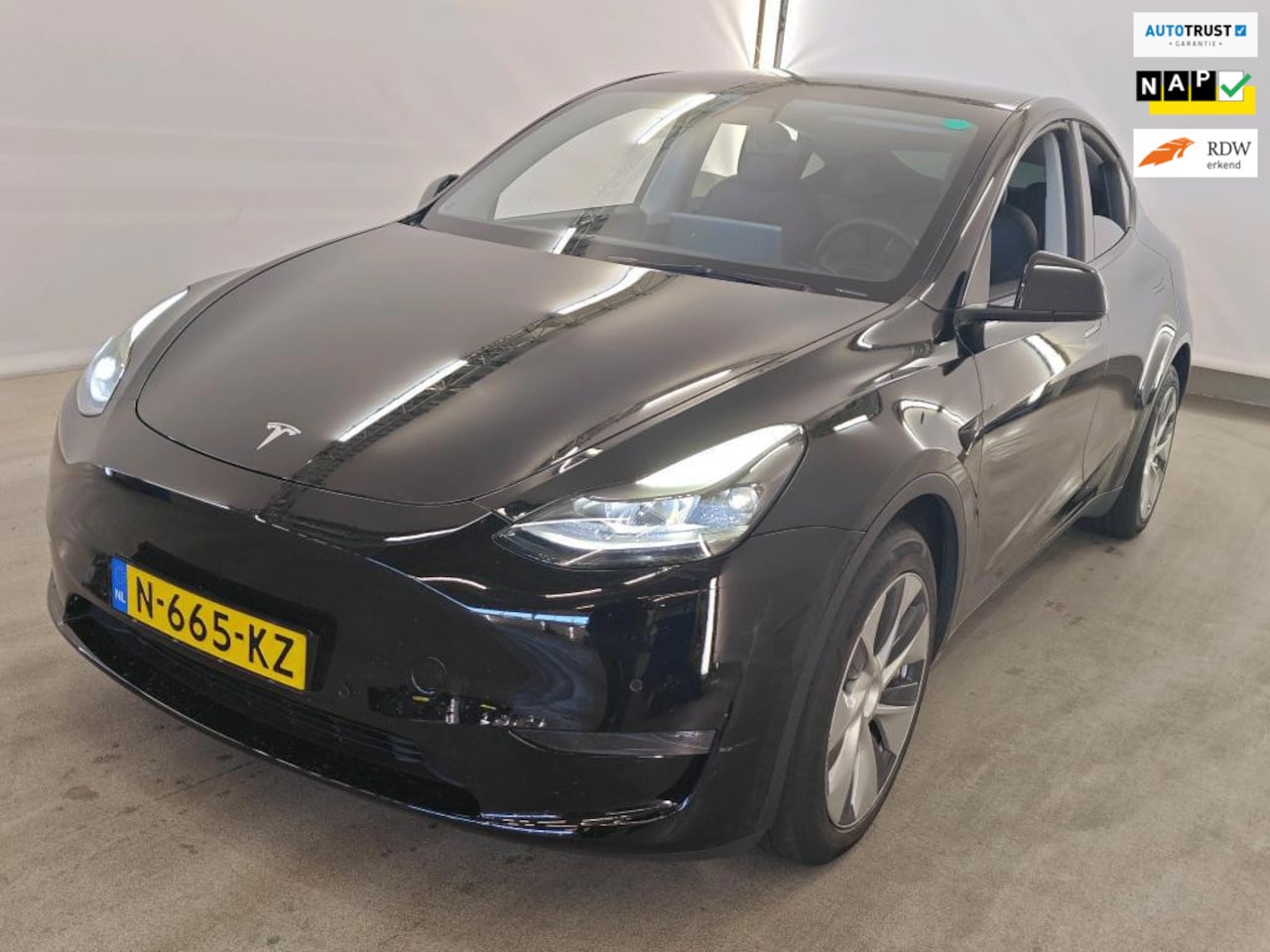 Tesla Model Y - Long Range AWD 75 kWh SOH 90% TREKHAAK PANO - AutoWereld.nl