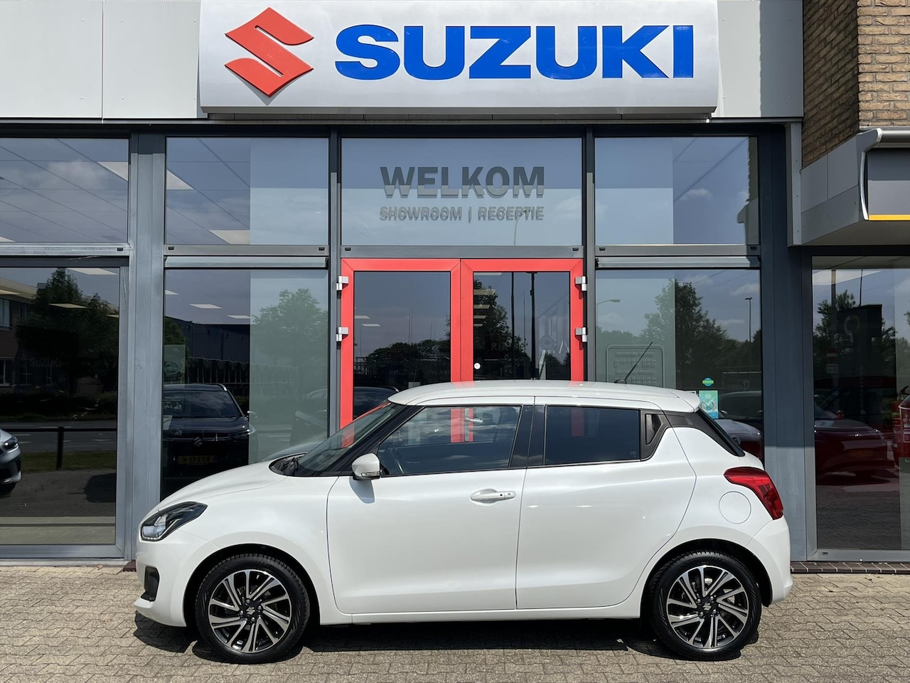Suzuki Swift - 1.2 DualJet 83pk Smart Hybrid S& - AutoWereld.nl