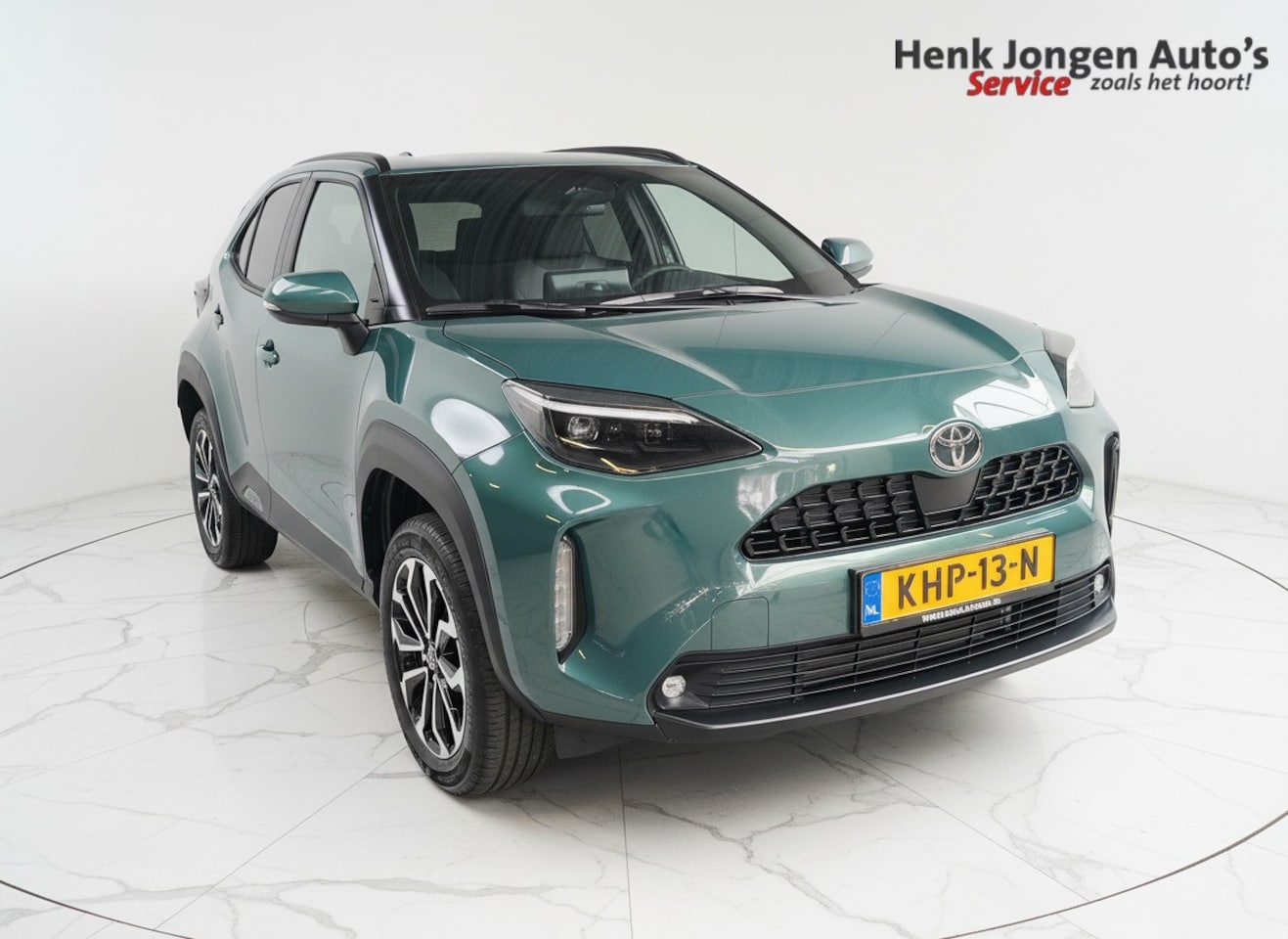 Toyota Yaris Cross - 1.5 Hybrid 115 First Edition Rijklaar + Fabrieksgarantie Henk Jongen Auto's in Helmond,  a - AutoWereld.nl