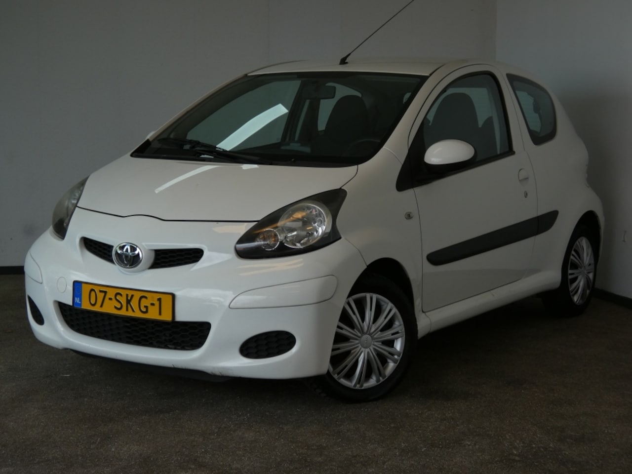 Toyota Aygo - 1.0-12V Comfort Nav. NWE APK - AutoWereld.nl