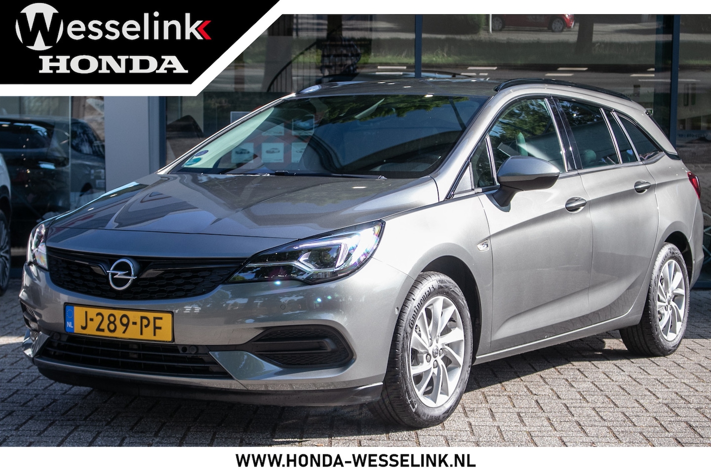 Opel Astra Sports Tourer - 1.2 Elegance - Trekhaak | Navigatie | Cruise control - AutoWereld.nl
