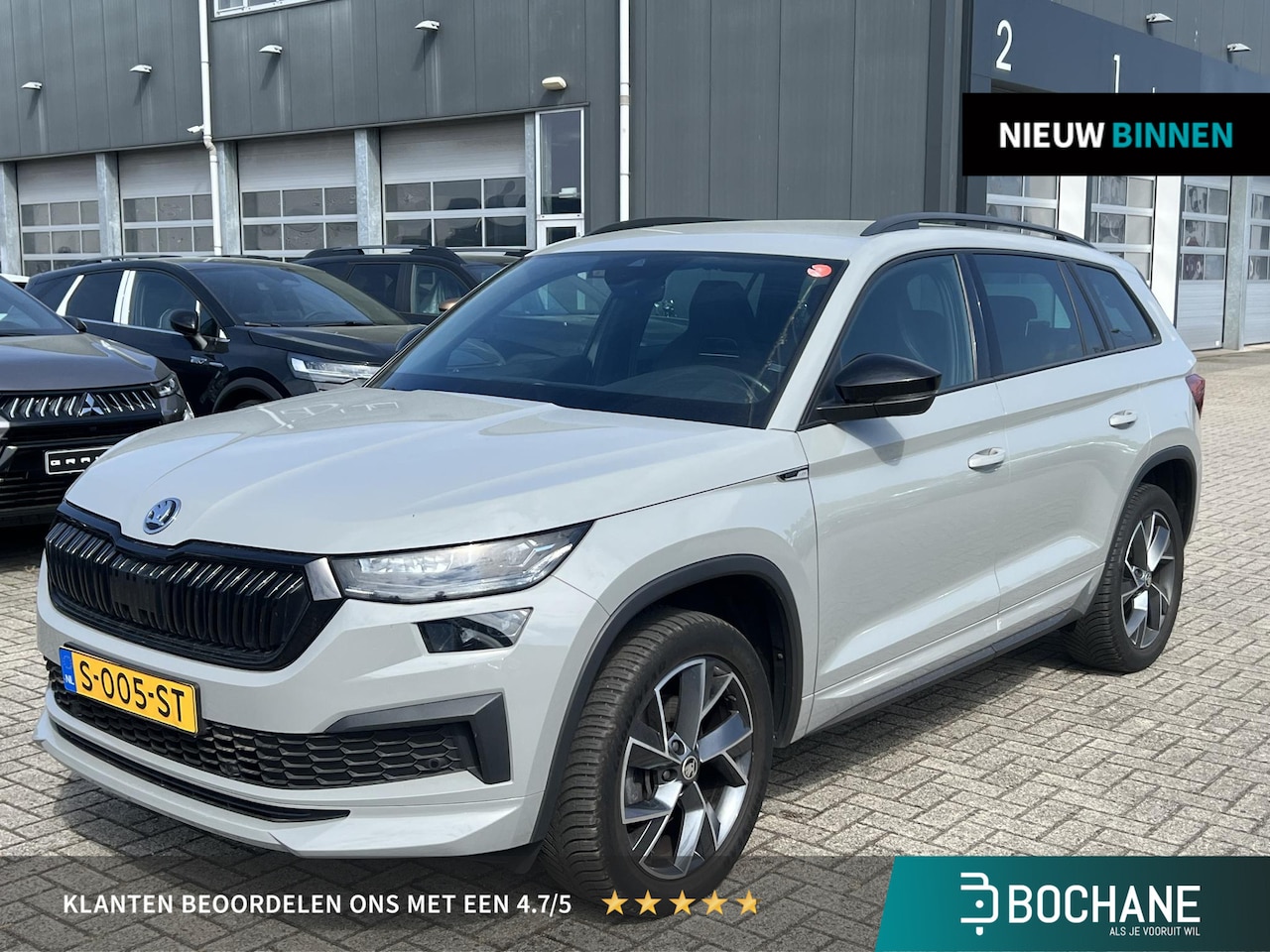 Skoda Kodiaq - 1.5 TSI Sportline Business 7p. | 7 persoons | Camera | Navigatie | Carplay | Trekhaak - AutoWereld.nl