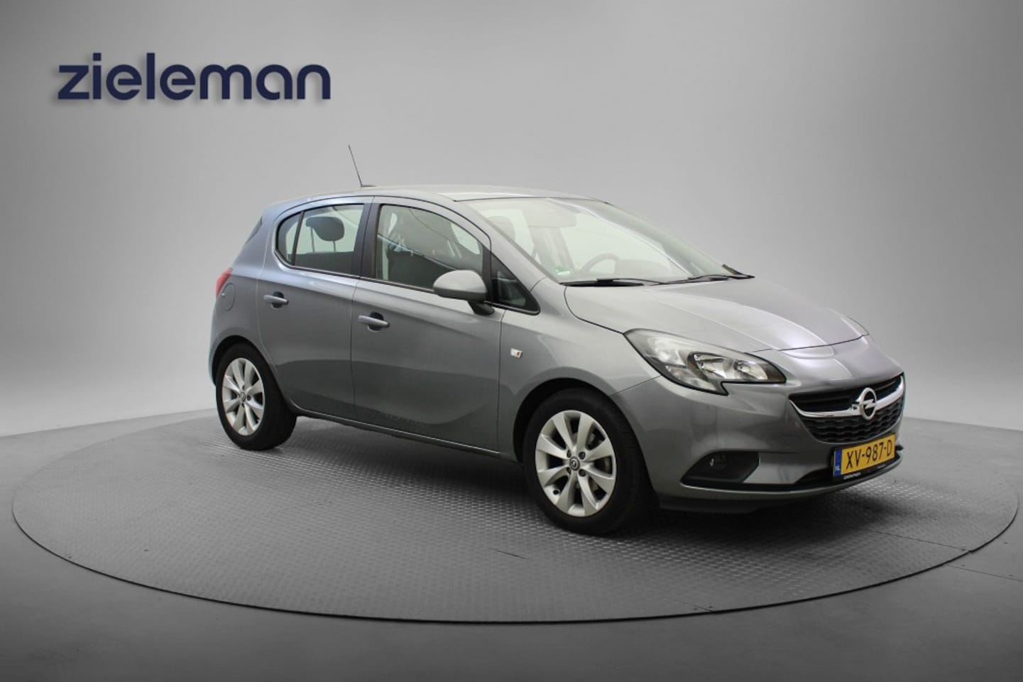 Opel Corsa - 1.4 Favourite - Carplay, Navi, Cruise, Lichtmetalen Velgen - AutoWereld.nl