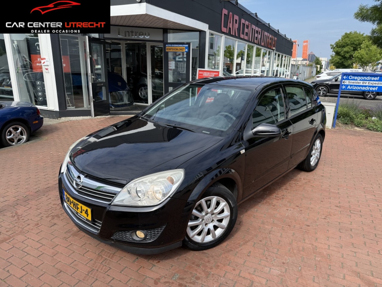 Opel Astra - 1.8 Temptation airco navi cruise control 5drs - AutoWereld.nl