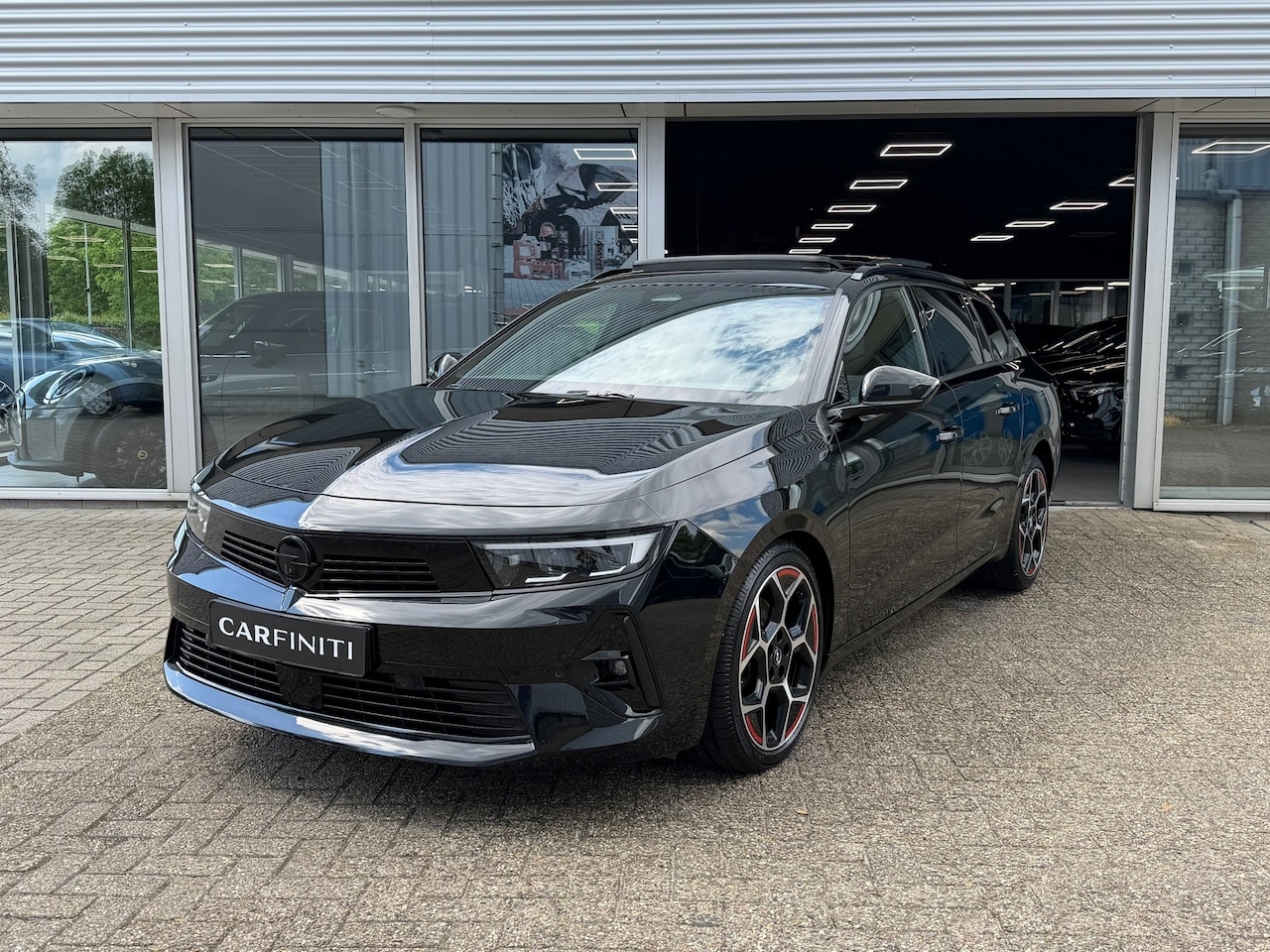 Opel Astra Sports Tourer - 1.2 Business Elegance 1.2 Business Elegance - AutoWereld.nl