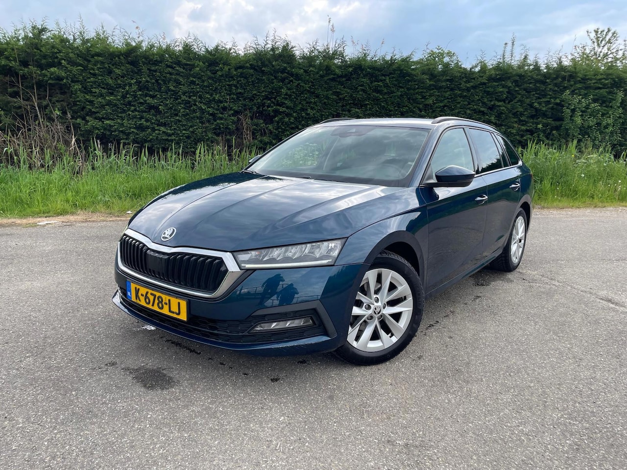 Skoda Octavia Combi - 1.0 e-TSI HYBRIDE SPORT ECC NAVI KEYLESS - AutoWereld.nl