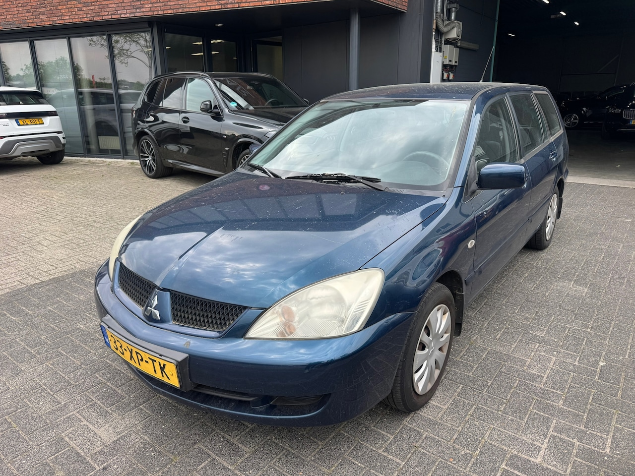 Mitsubishi Lancer Station Wagon - 1.6 Inform AIRCO RIJDT GOED - AutoWereld.nl