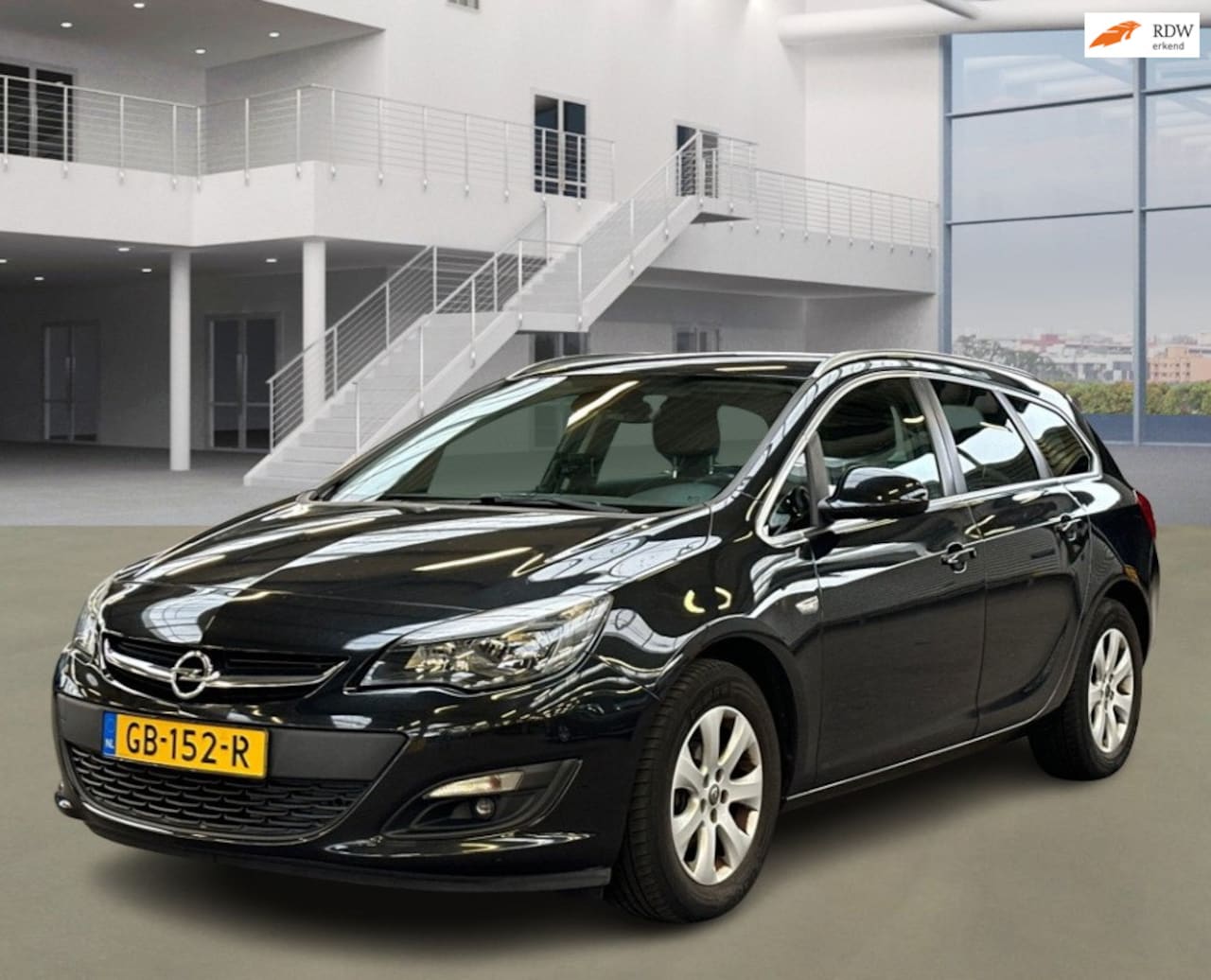 Opel Astra Sports Tourer - 1.4 Turbo Blitz NAVI PSENSOR TREKHAAK CRUISE 2 X SLEUTELS - AutoWereld.nl