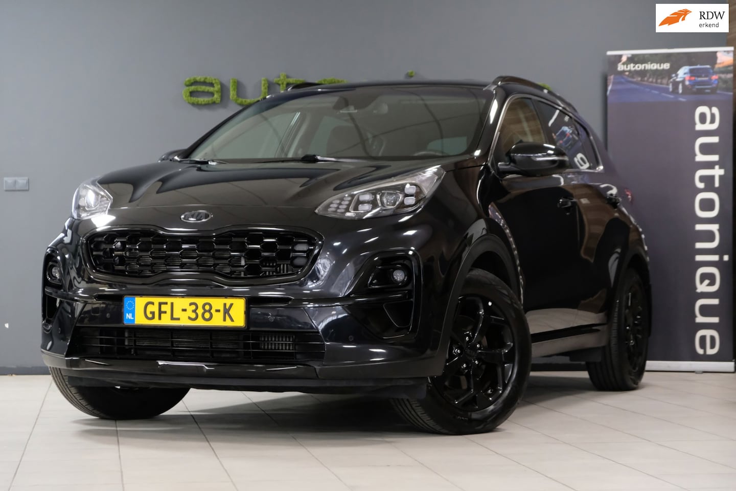 Kia Sportage - 1.6 T-GDI DynamicLine *Black Edition* 57dkm! UNIEKE Auto! Navi/Camera - AutoWereld.nl