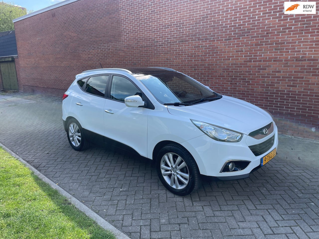 Hyundai ix35 - 2.0i 4WD i-Catcher Navi Clima Cruise Pano - AutoWereld.nl