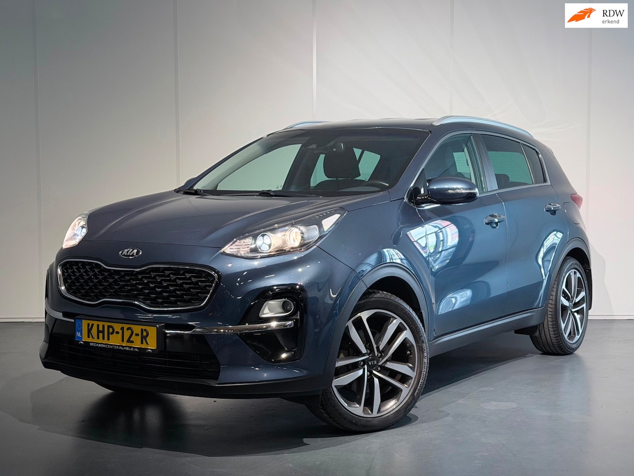 Kia Sportage - 1.6 T-GDI DynamicLine /Clima/Cruise/LED/Camera/NAVI/Leer/CarPlay/LaneAss - AutoWereld.nl