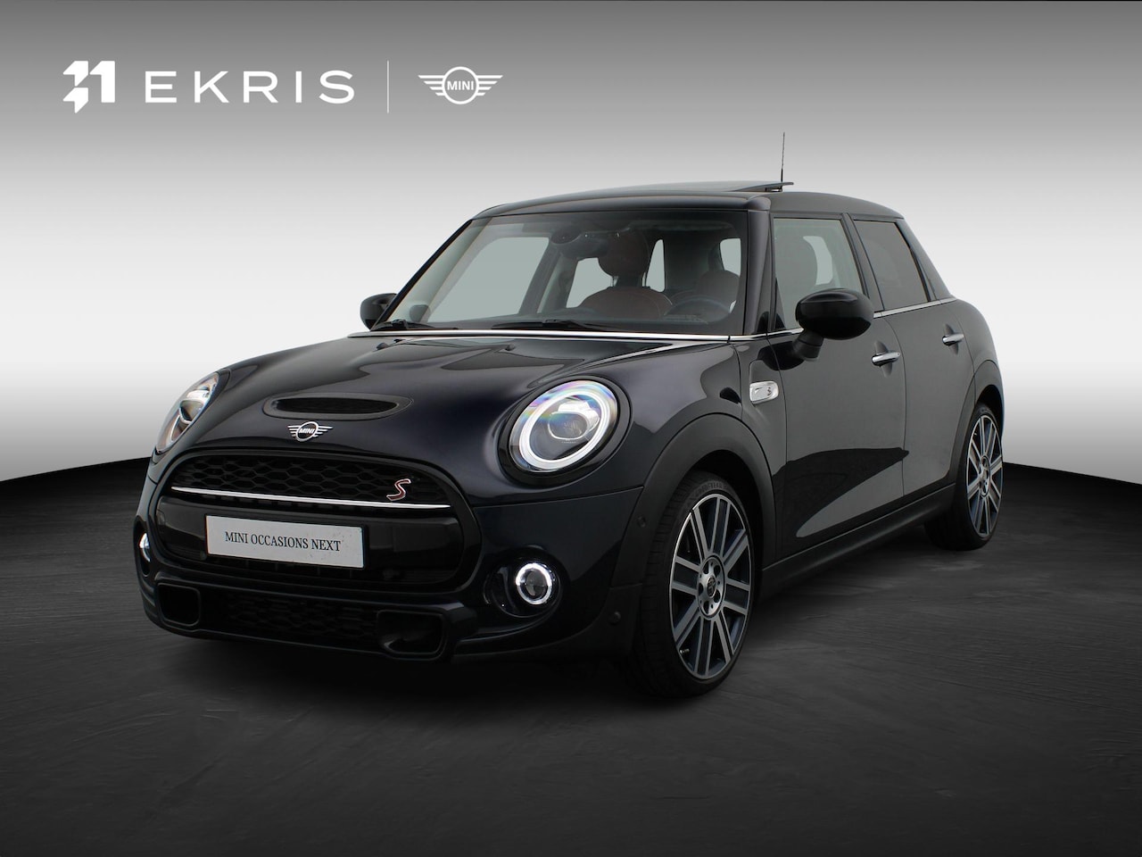 MINI Cooper S - 5-deurs JCW Pakket +Serious Business + Achteruitrijcamera + Glazen panoramadak + Harman-Ka - AutoWereld.nl