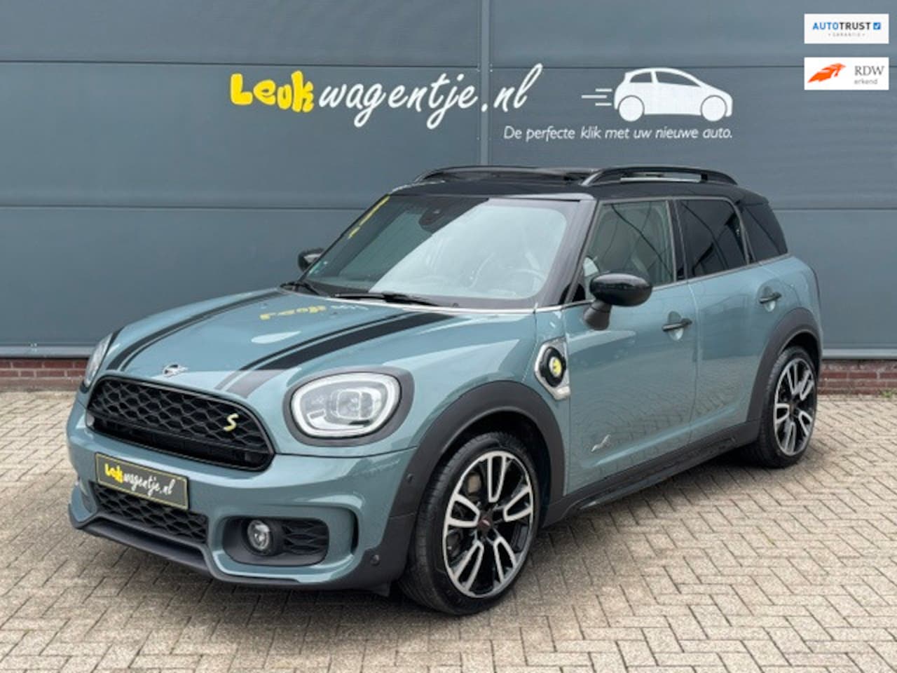 MINI Countryman - Mini 1.5 Cooper SE ALL4 Aut. *schuifdak *JCW - AutoWereld.nl