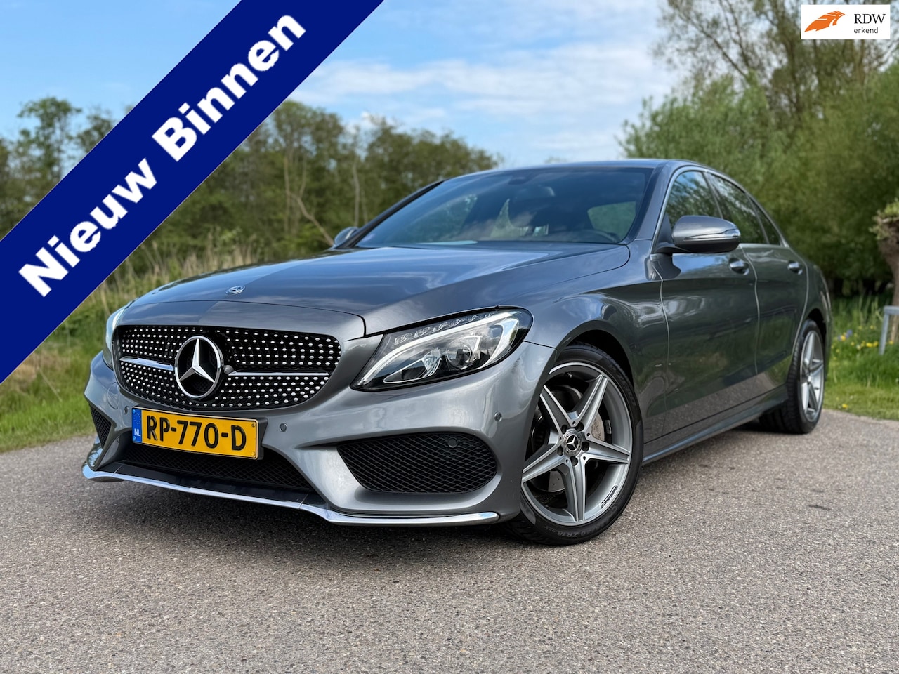 Mercedes-Benz C-klasse - 180 Business Solution AMG / NL Auto / Automaat / Clima / Navi / Camera / Sportstoelen / Le - AutoWereld.nl