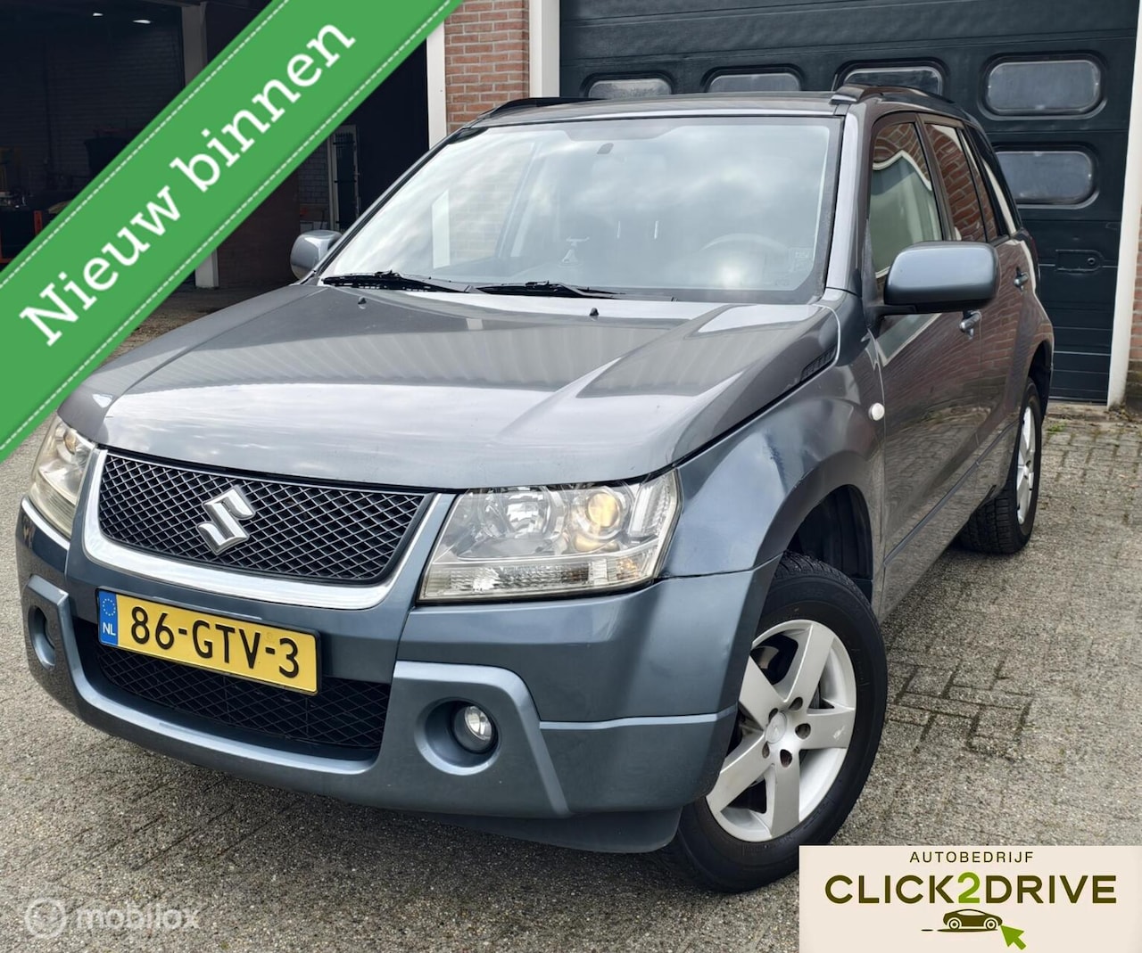 Suzuki Grand Vitara - 2.0-16V Exclusive 2.0-16V Exclusive - AutoWereld.nl