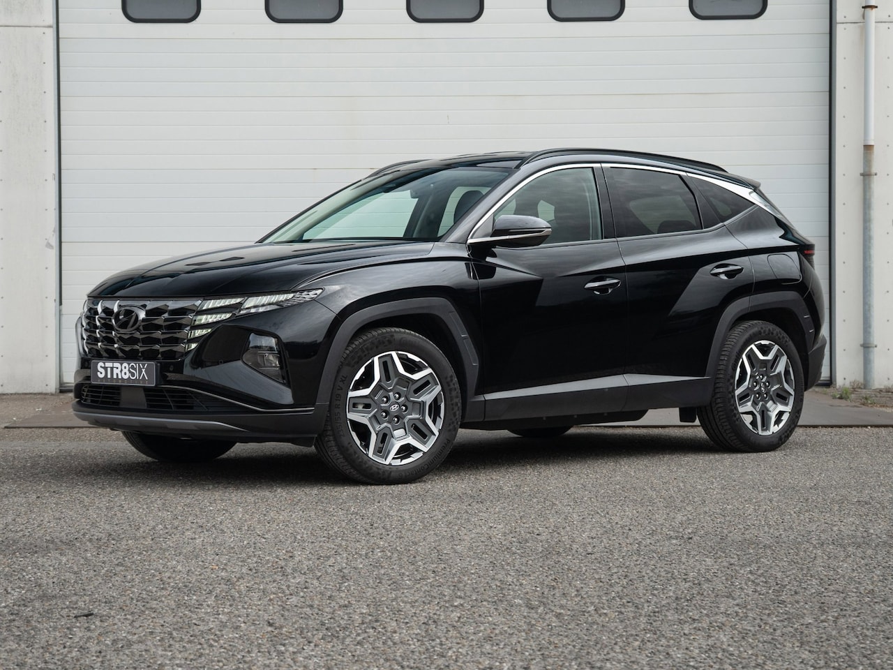Hyundai Tucson - 1.6 T-GDI (2021) 180 PK PHEV Comfort 4WD | Navi Full Map | Verwarm. stoelen + stuurwiel | - AutoWereld.nl
