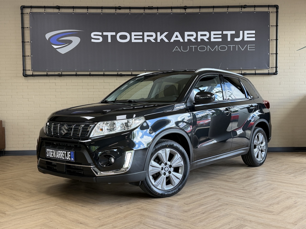 Suzuki Vitara - 1.4 Boosterjet Comfort | Navi | Stoelverwarming | 17" | Camera | Carplay | Cruise | 100% o - AutoWereld.nl