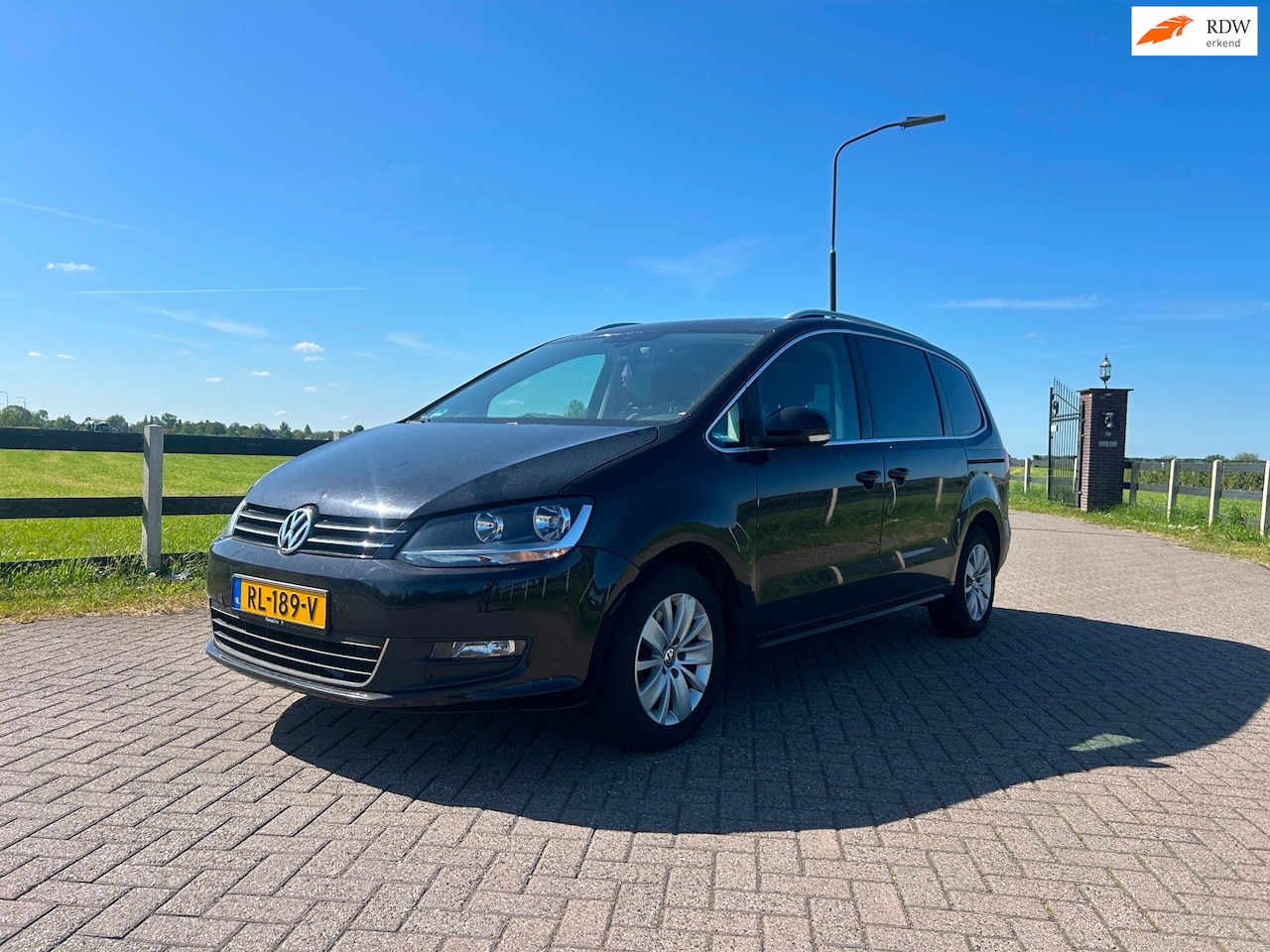 Volkswagen Sharan - 2.0 TDI Highline DSG Full Option 7 Pers 7P Euro 6 - AutoWereld.nl