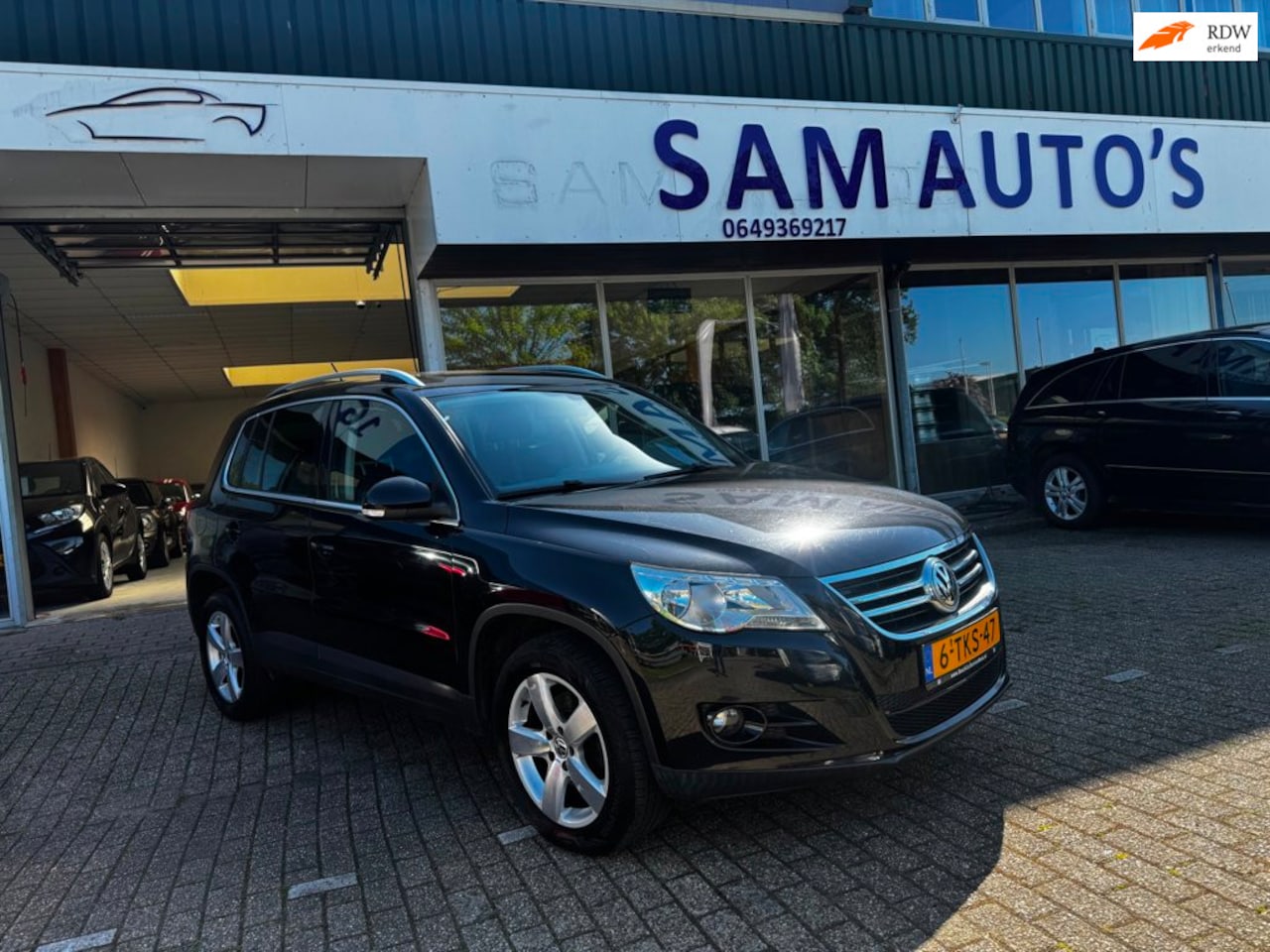 Volkswagen Tiguan - 1.4 TSI Sport&Style - AutoWereld.nl