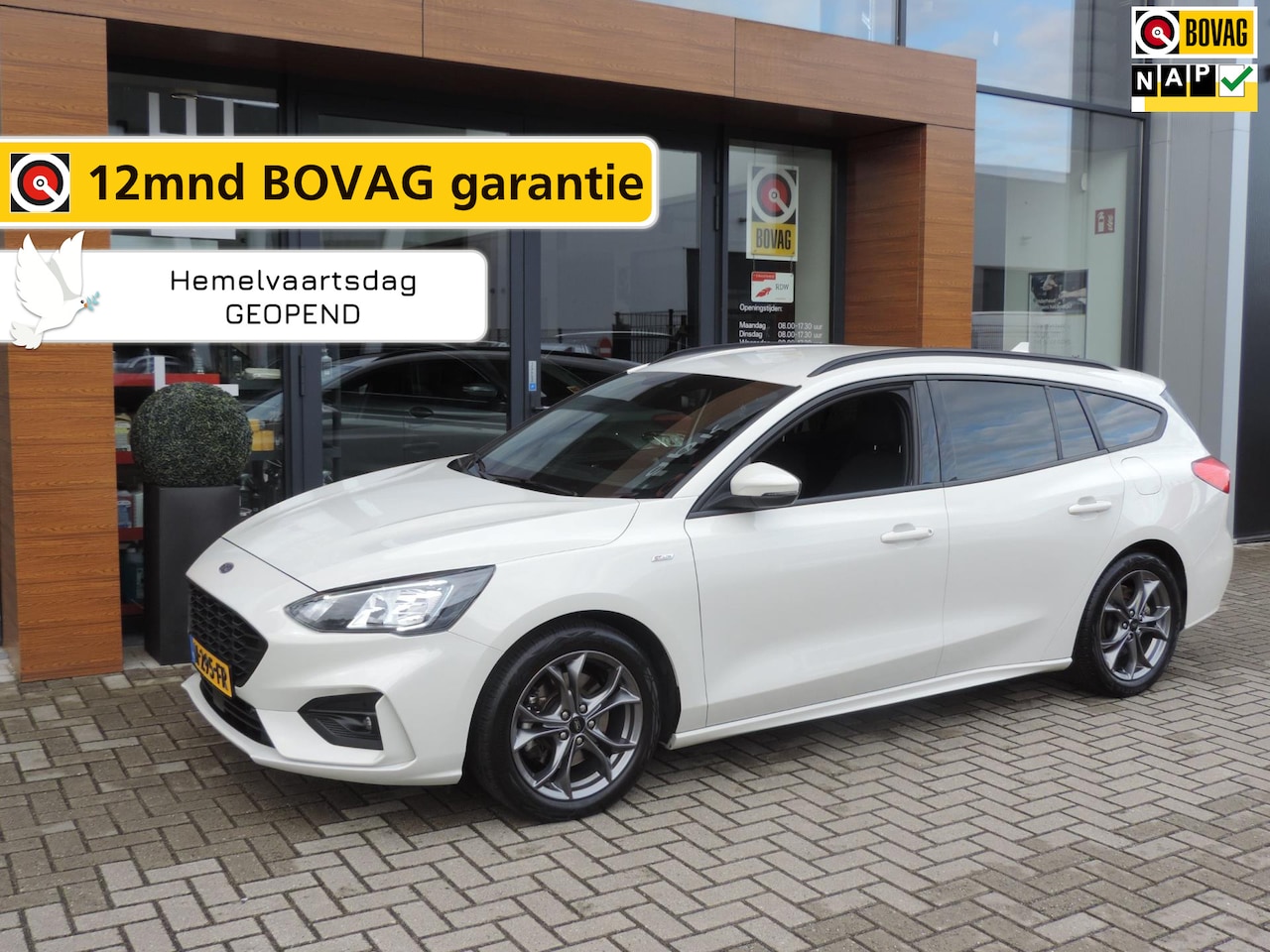 Ford Focus Wagon - 1.0-T 125PK Hybrid ST Line Business | 1e Eig | Metropolis White | Winterpack | 17” | Keyle - AutoWereld.nl