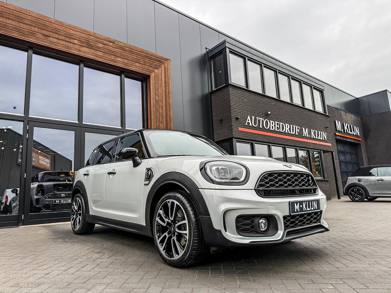 MINI Countryman - Mini 2.0 Cooper S E ALL4 John Cooper Works aut 220pk/Camera/19"Jcw/Navi/Led - AutoWereld.nl