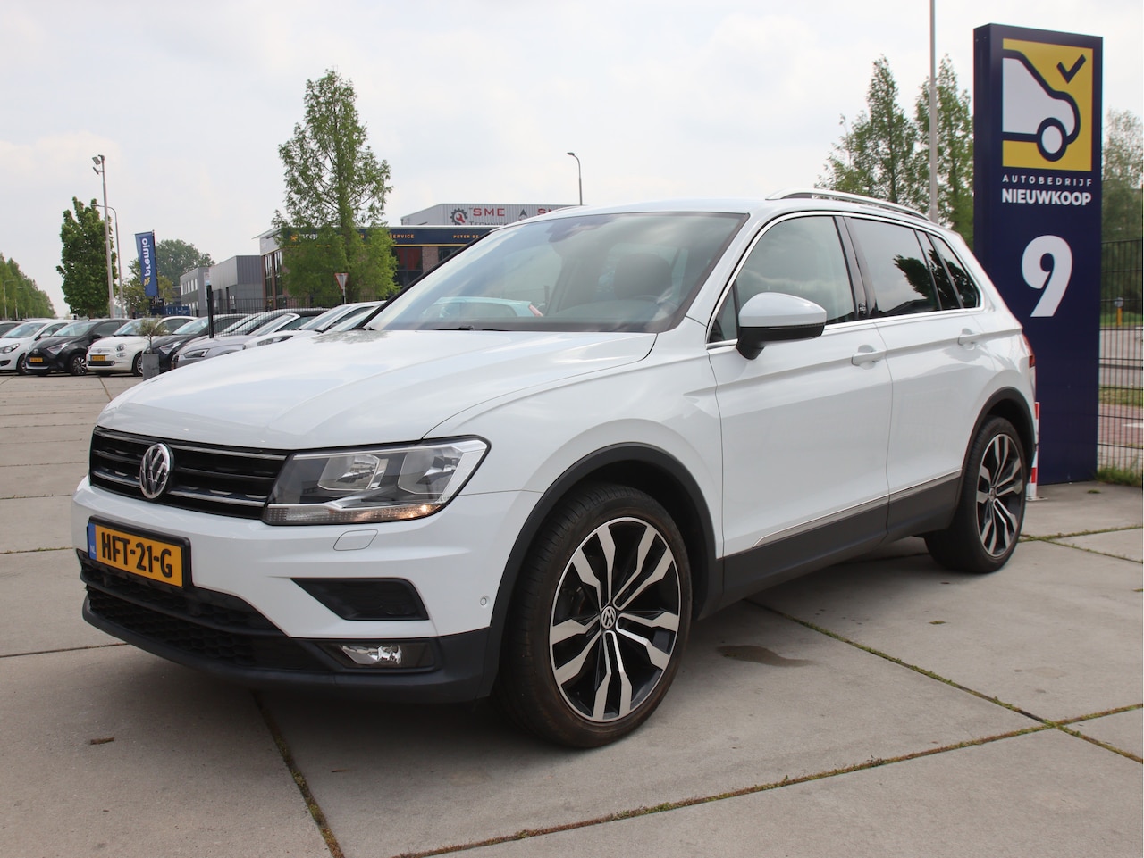 Volkswagen Tiguan - 1.4 TSI 150pk Comf. Business DSG, Carplay/Camera, winter pakket, trekhaak SALE!! - AutoWereld.nl