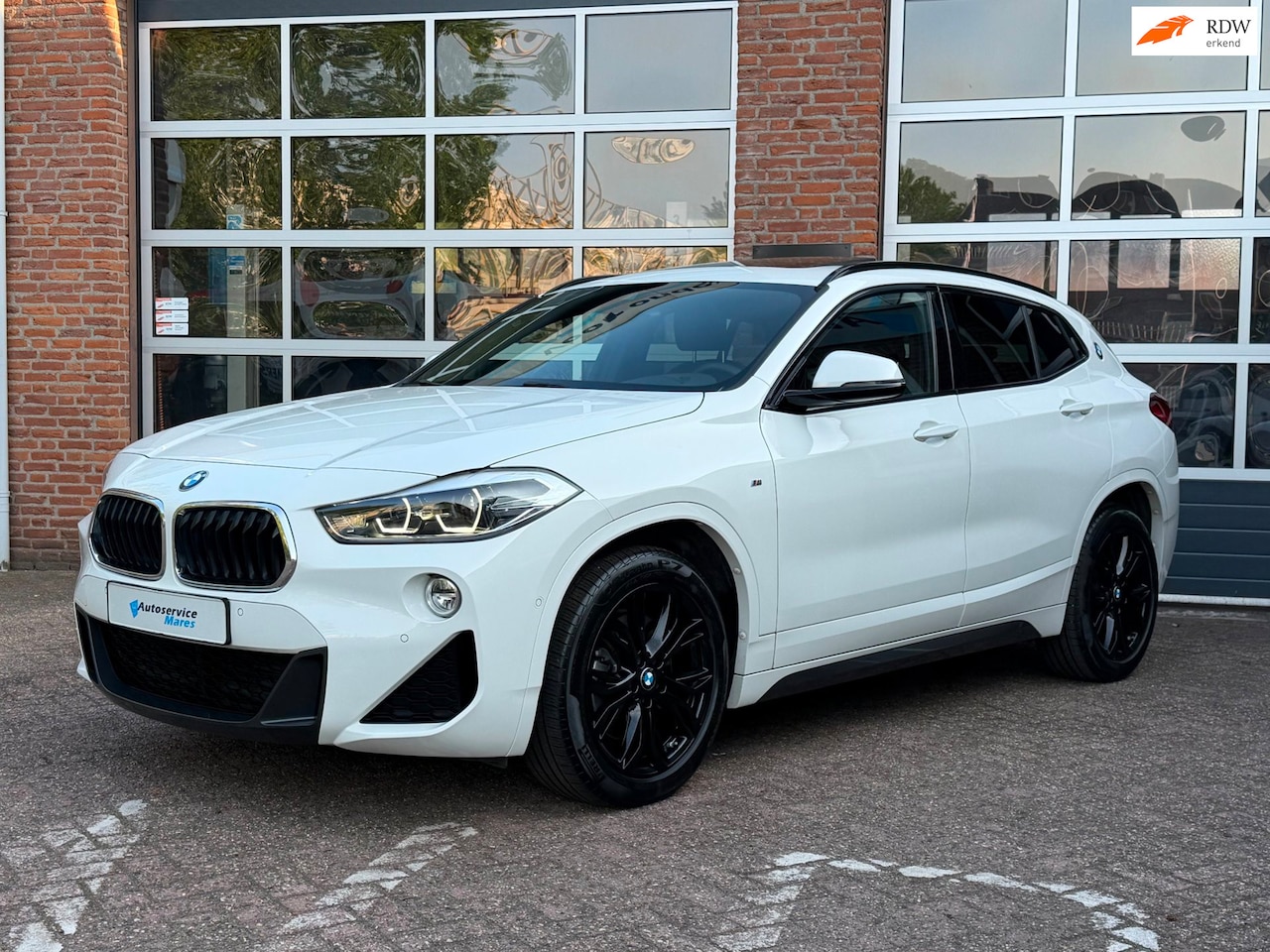BMW X2 - SDrive20i M Sport, navi, adapt cruise, pano dak, keyless, leder - AutoWereld.nl