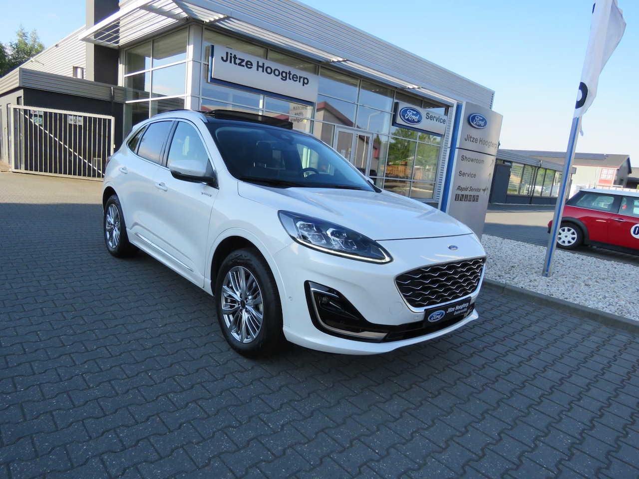 Ford Kuga - 2.5 Duratec PHEV Vignale NAVI,ADAP CRUISE,PANODAK,ELEKTRISCHE TREKHAAK,LEER,WINTER PAKKET, - AutoWereld.nl