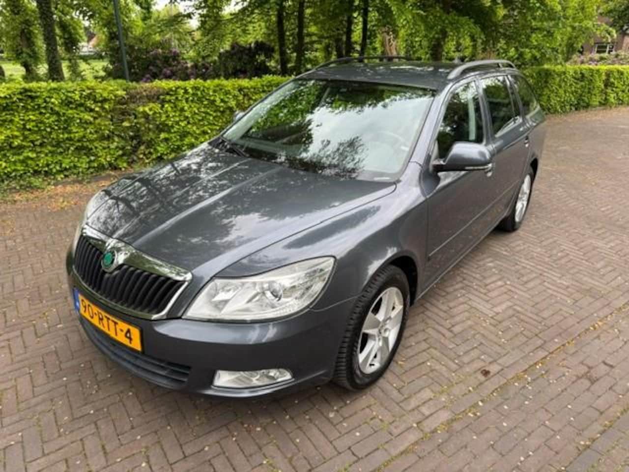 Skoda Octavia Combi - 1.2TSI Ambition Business/Trekhaak/Navi/Cruise/Airco/Apk Nieuw - AutoWereld.nl