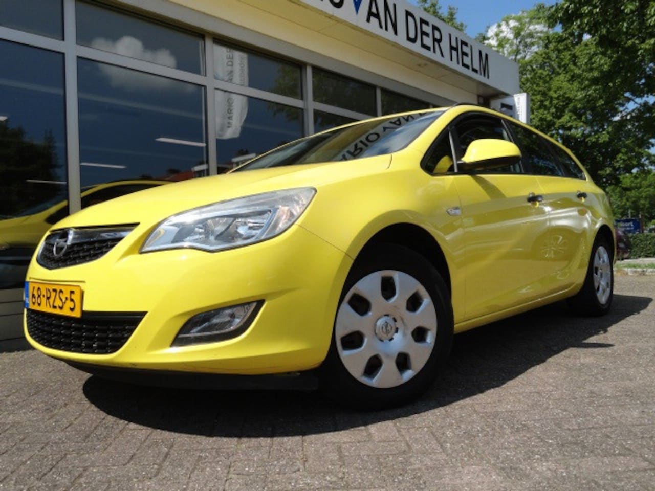 Opel Astra Sports Tourer - 1.4 Edition / Airco - AutoWereld.nl