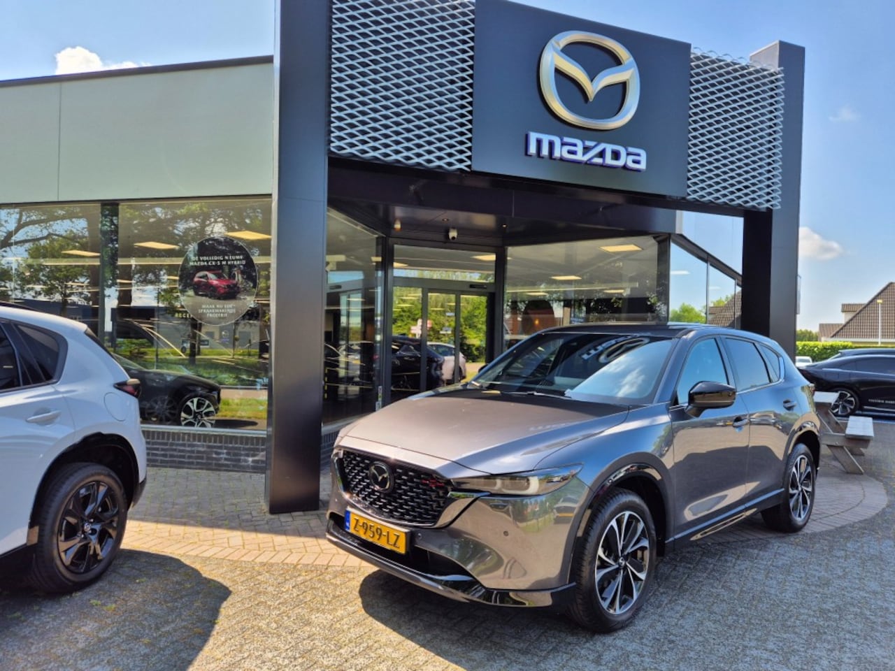 Mazda CX-5 - E-SKYACTIV-G 2.0 165 6AT M-HYBRID HOMURA  Comfort Pack / Trekhaak / 360Camera - AutoWereld.nl