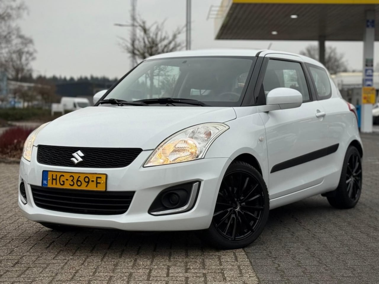 Suzuki Swift - 1.2 3DRS COMFORT LM 17 INCH AIRCO STOELVERWARMING - AutoWereld.nl