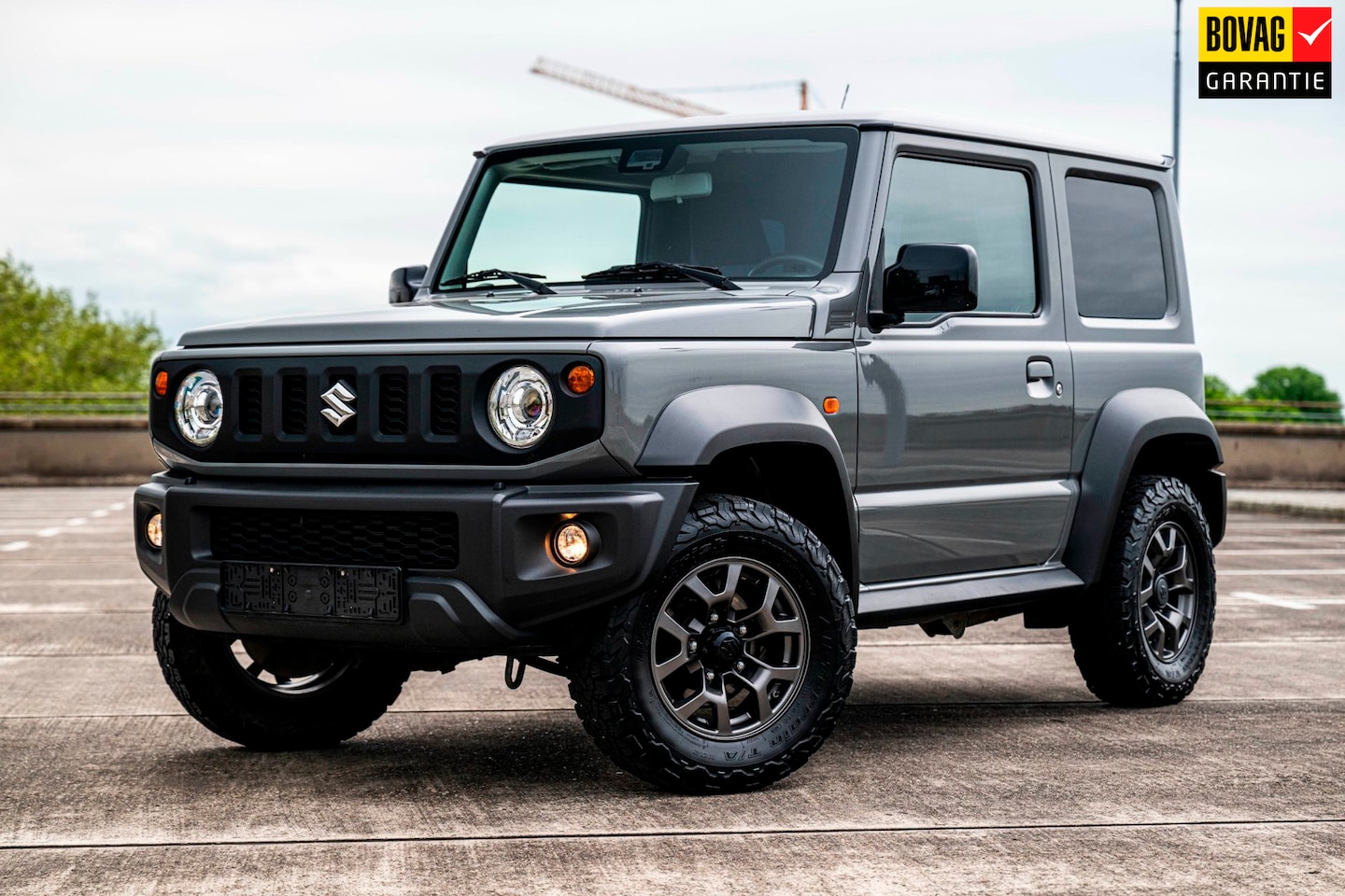 Suzuki Jimny - 1.5 Stijl | 4 Persoons | Airco/Clima | Cruise Control | Navigatie | Stoelverwarming | Trek - AutoWereld.nl