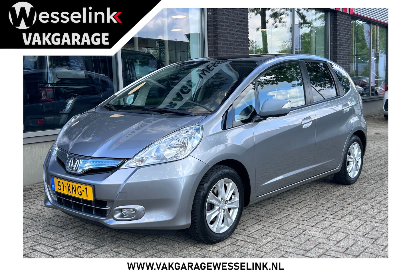 Honda Jazz - 1.4 Hybrid Elegance | fietsendrager set | panorama dak | All season banden | - AutoWereld.nl
