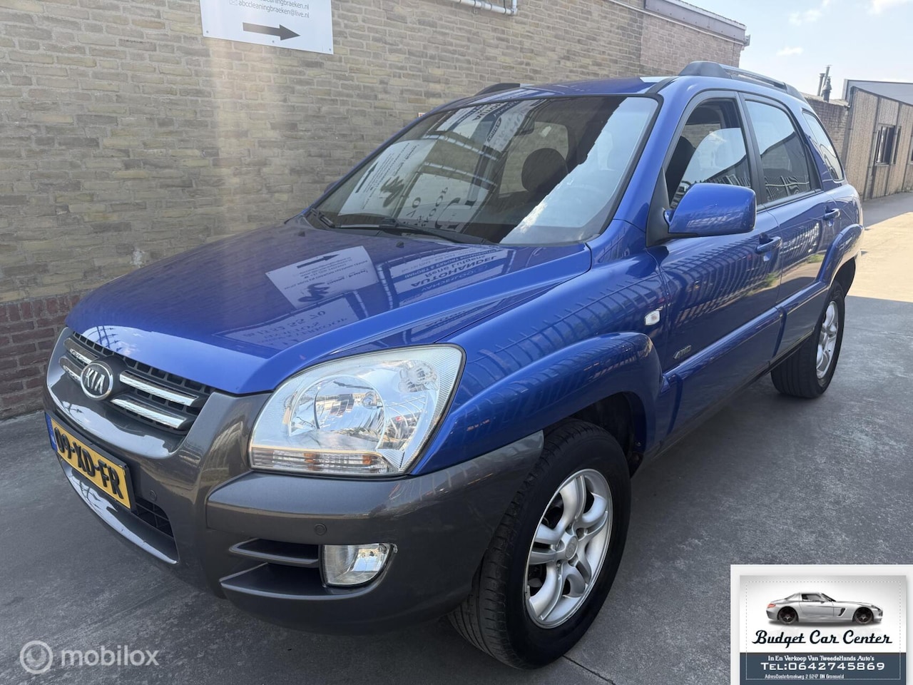 Kia Sportage - 2.0 CVVT Adventure 4WD 2.0 CVVT Adventure 4WD - AutoWereld.nl
