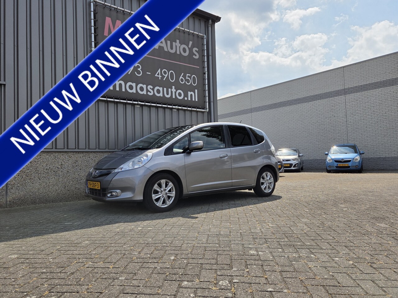 Honda Jazz - 1.4 Hybrid hoge-instap Elegance uitvoering automaat panorama-dak - AutoWereld.nl