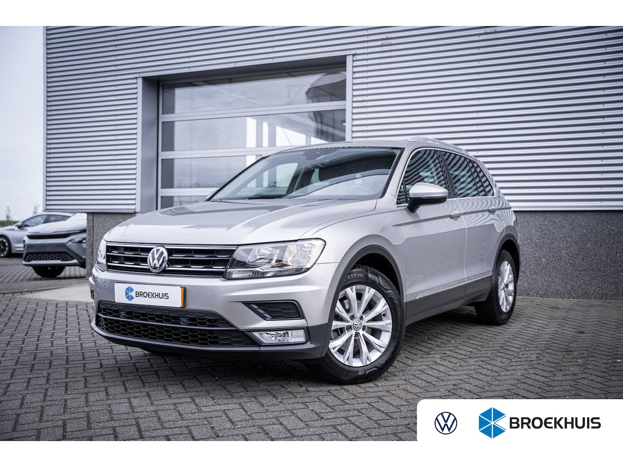 Volkswagen Tiguan - 1.4 TSI Comfortline | Cruise control | Parkeersensor voor en achter | Trekhaak elektrisch - AutoWereld.nl