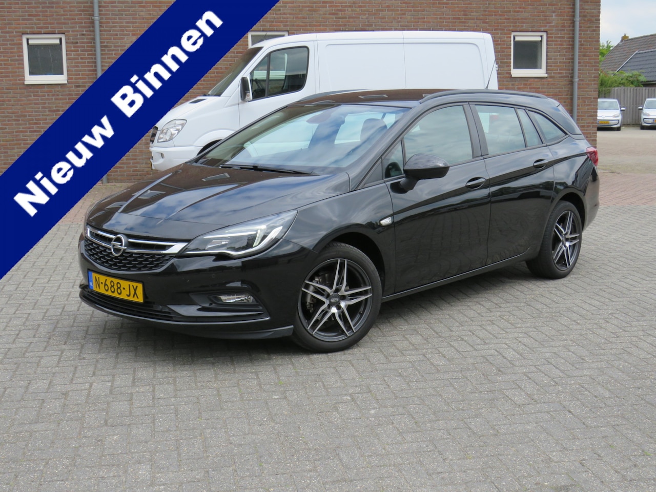 Opel Astra Sports Tourer - 1.4 Turbo 125Pk Edition * Rijklaar0prijs incl. garantie * Trekhaak * Camera * Navi * Stoel - AutoWereld.nl