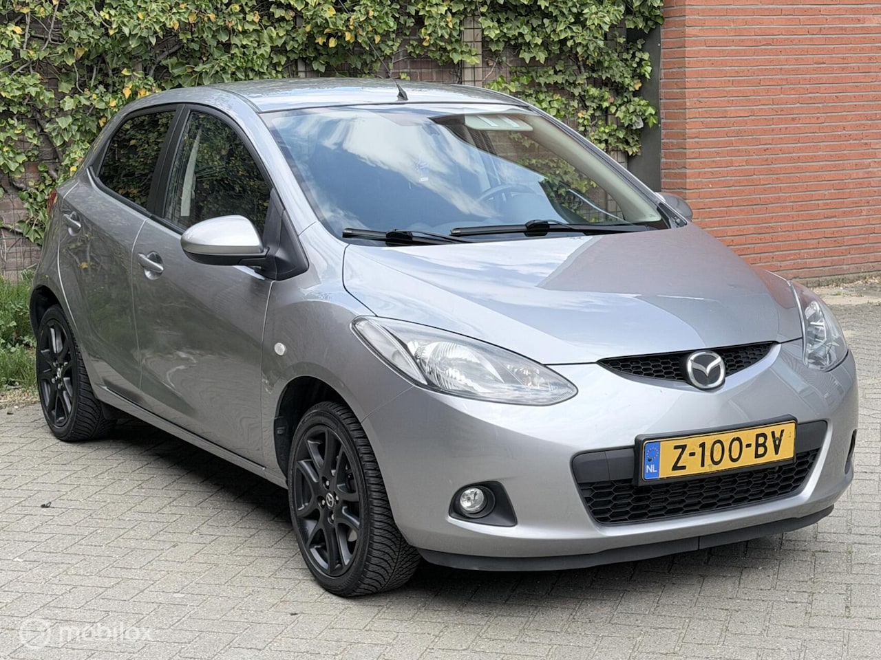 Mazda 2 - 1.3 TS Plus Airco Navi Parkeer sensoren Stoelverwarm - AutoWereld.nl