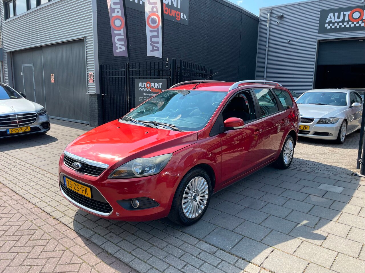 Ford Focus Wagon - 1.6 Titanium Trekhaak Airco Navi PDC NAP APK - AutoWereld.nl